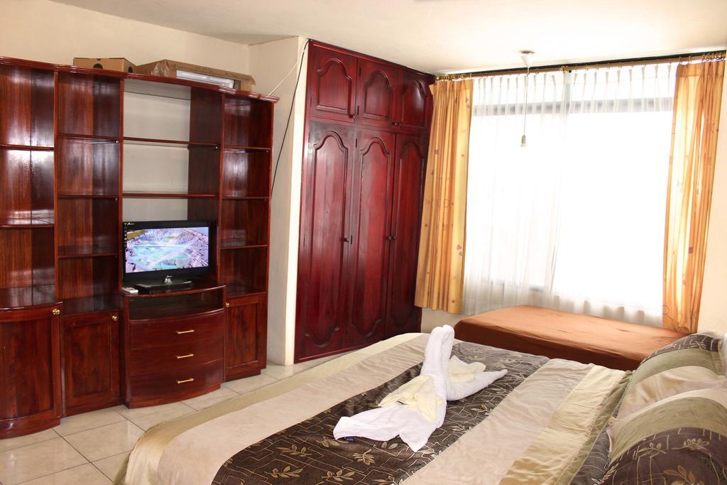 Planet House Hotel Puerto Ayora  Kamer foto